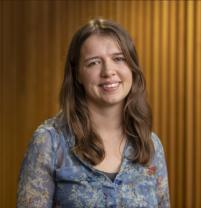 Portrait of Francesca Pontin, female with brown hair smiles to camera