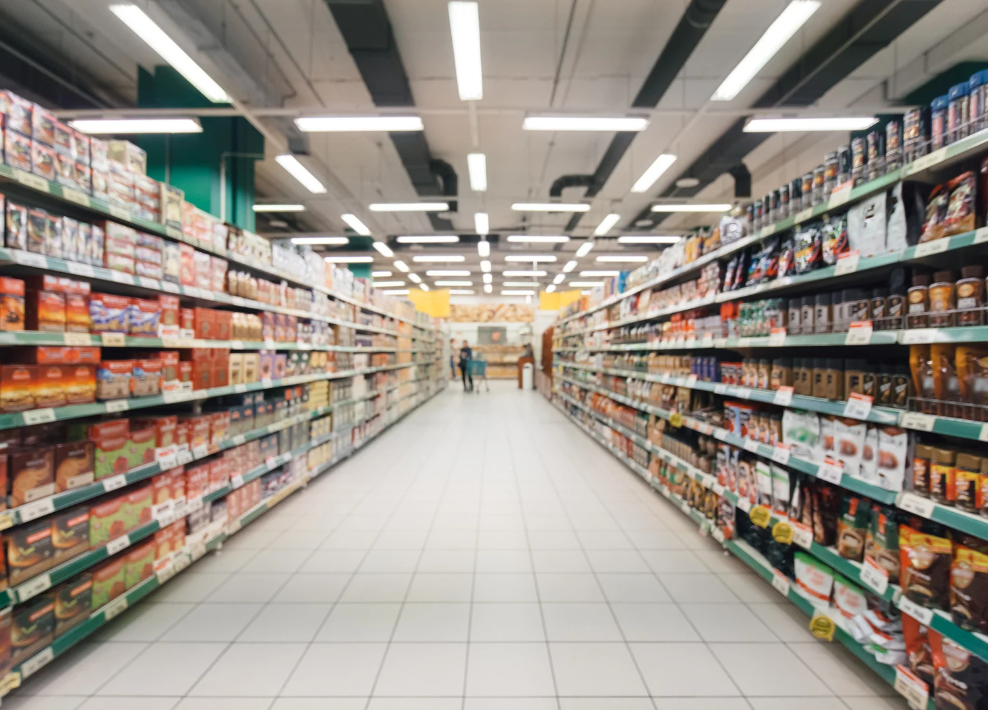 Blurred image of supermarket shelves containing food items